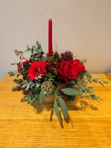 Red and gold candle arrangement in gold container